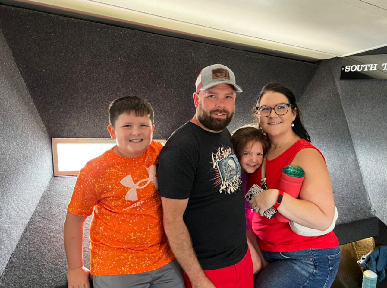 A Image of Tee Nation's Owner and his family.