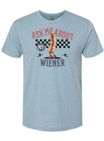 This funny t-shirt features the words Ask Me About My Wiener featuring a hotdog. This t-shirt was inspired by the move Accepted.