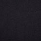 A close up of the black fabric that is used to make the t-shirt