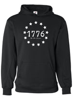 A black hoodie with 13 stars around 1775 with the words we the people.